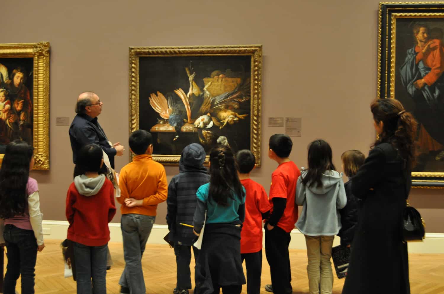Elementary and middle school students participating in an educational museum field trip focused on art observation