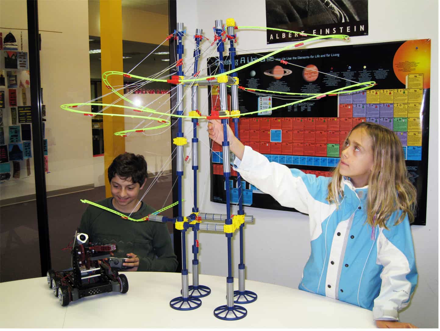 Middle school students engaged in STEM learning through hands-on engineering and design projects